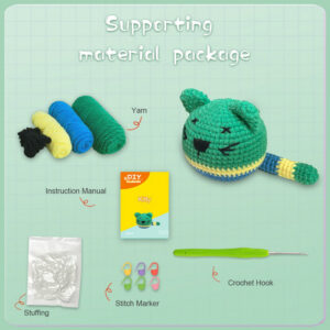 A completed green crochet cat plushie with a tutorial booklet video and yarn, displayed as part of a DIY crochet kit.